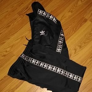 Adidas tape track suit!